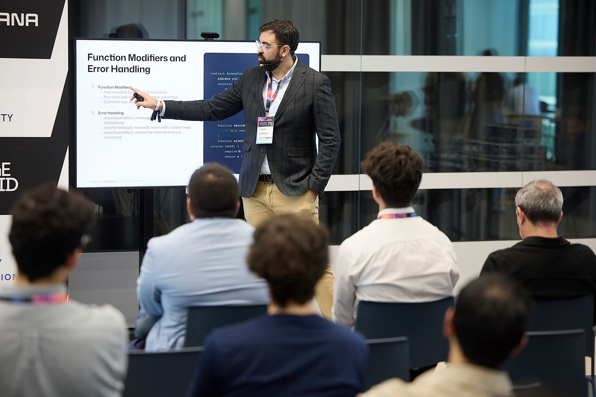 Isaac González of Metlabs giving a technical talk on smart contracts at a blockchain event