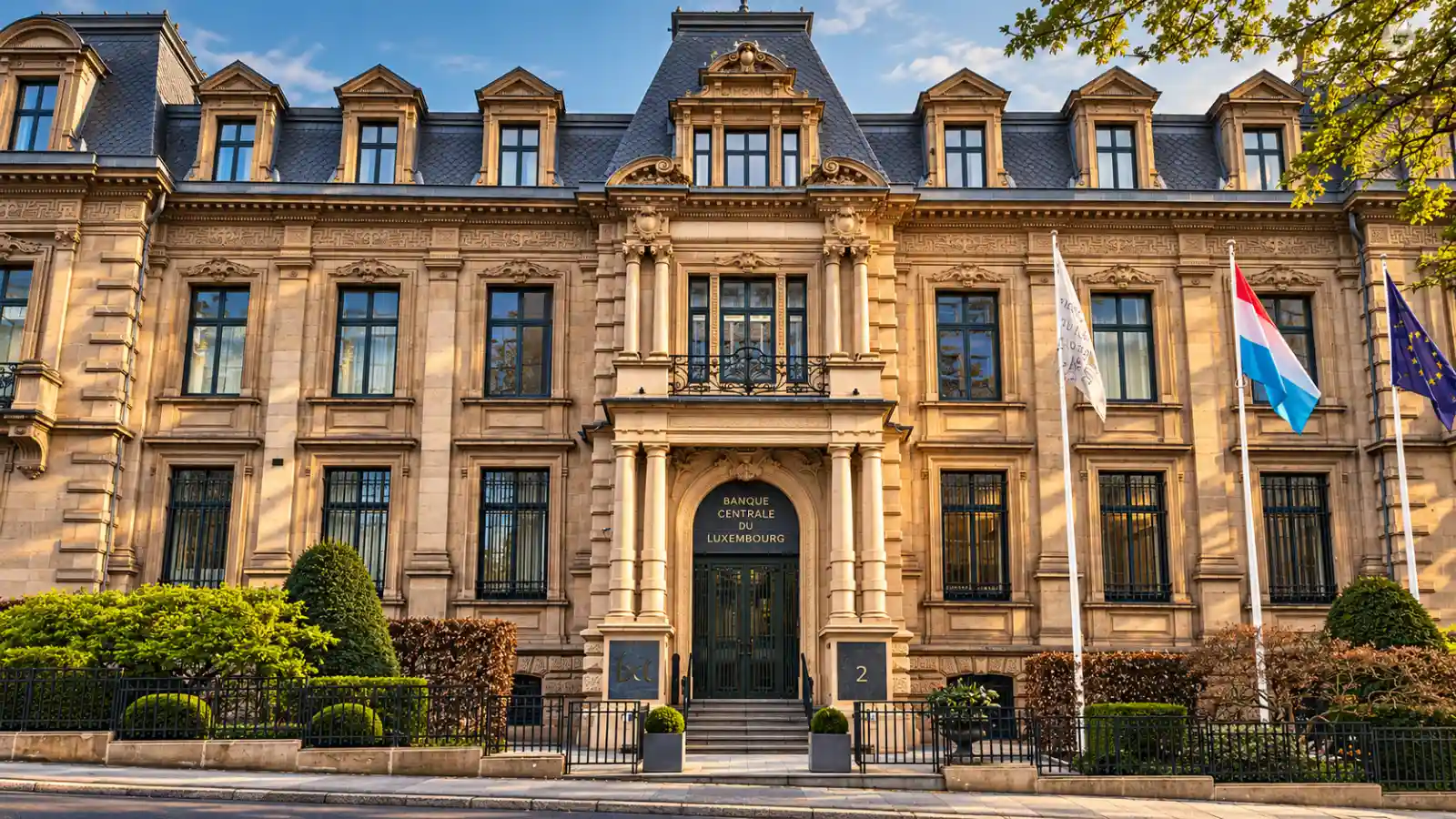 Stone facade of the Central Bank of Luxembourg, with its central balcony and Luxembourg flag