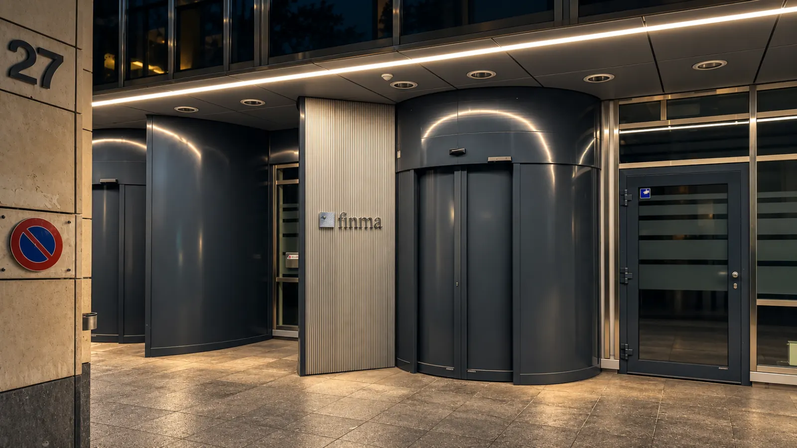 FINMA entrance at Laupenstrasse 27 in Bern, with metal doors and institutional signage