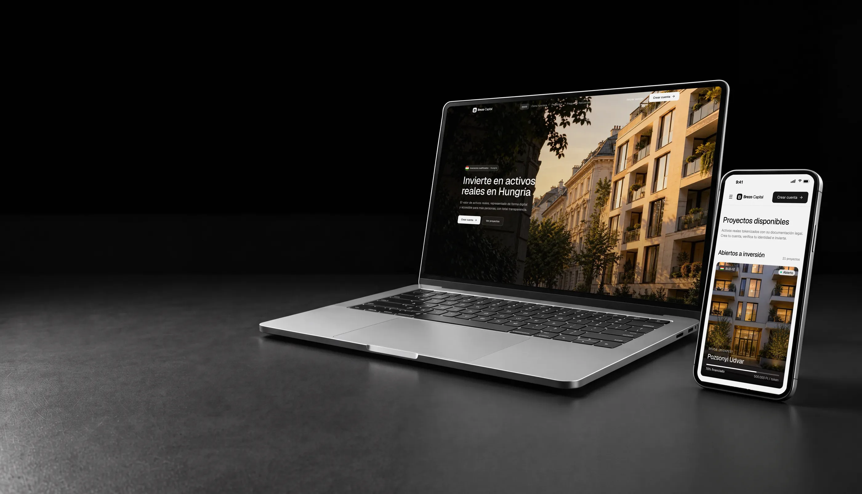 Plataforma white label de tokenización en Hungría en un portátil y un móvil, con un edificio residencial de Budapest