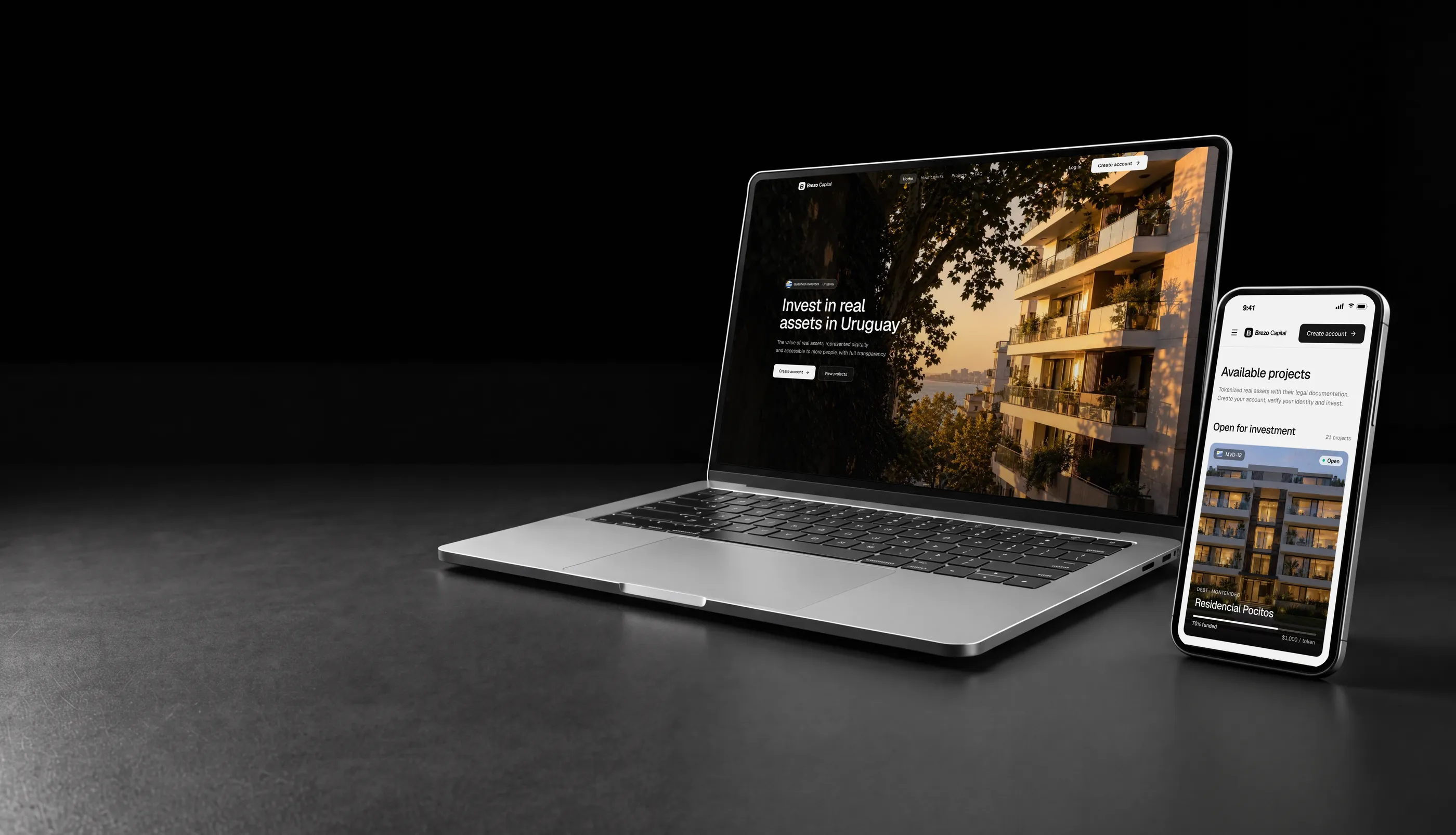 White label tokenization platform in Uruguay on a laptop and a phone, with a residential building in Montevideo