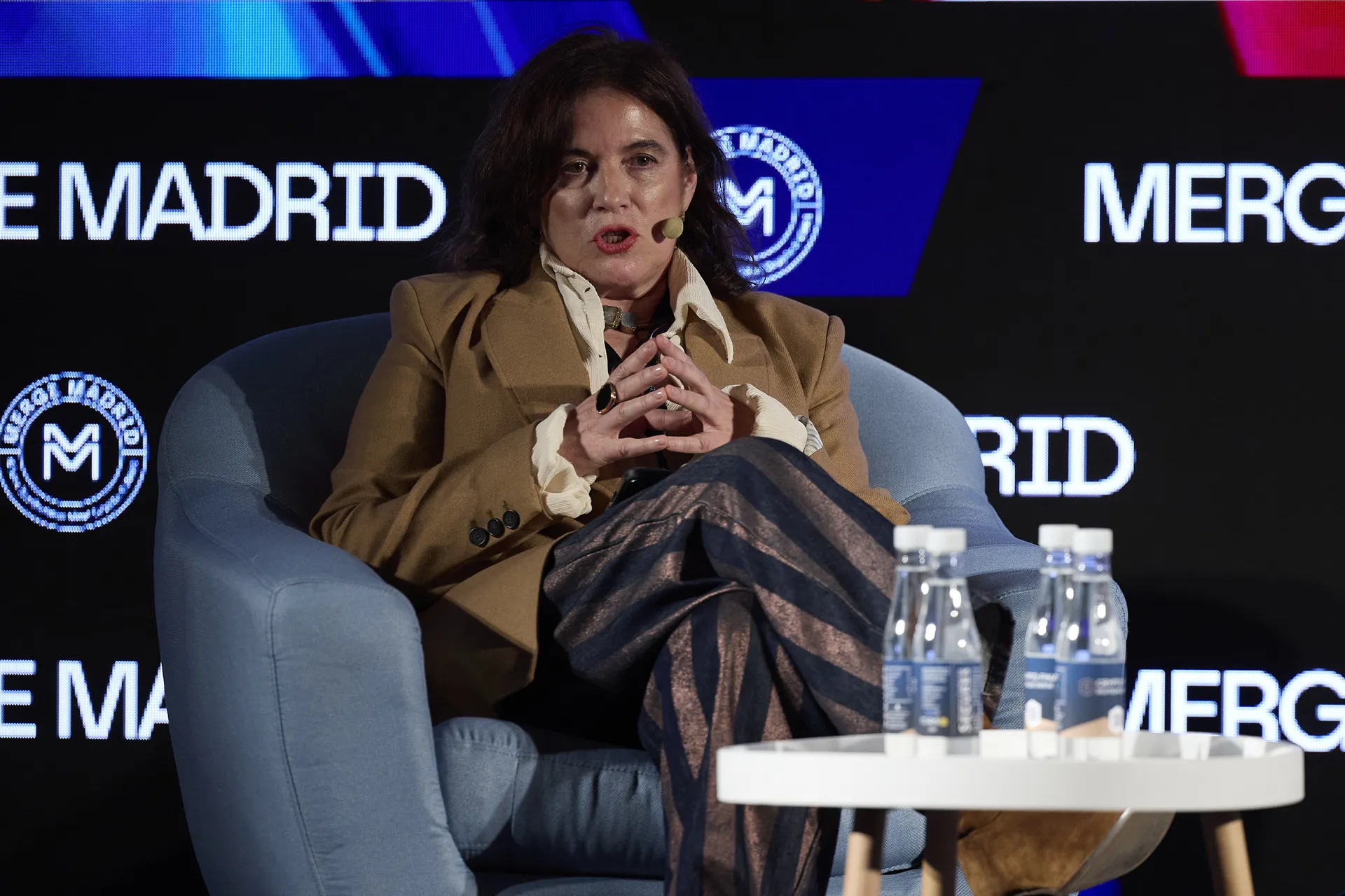 Covadonga Fernández of Observatorio Blockchain speaking from her armchair on the MERGE Stage