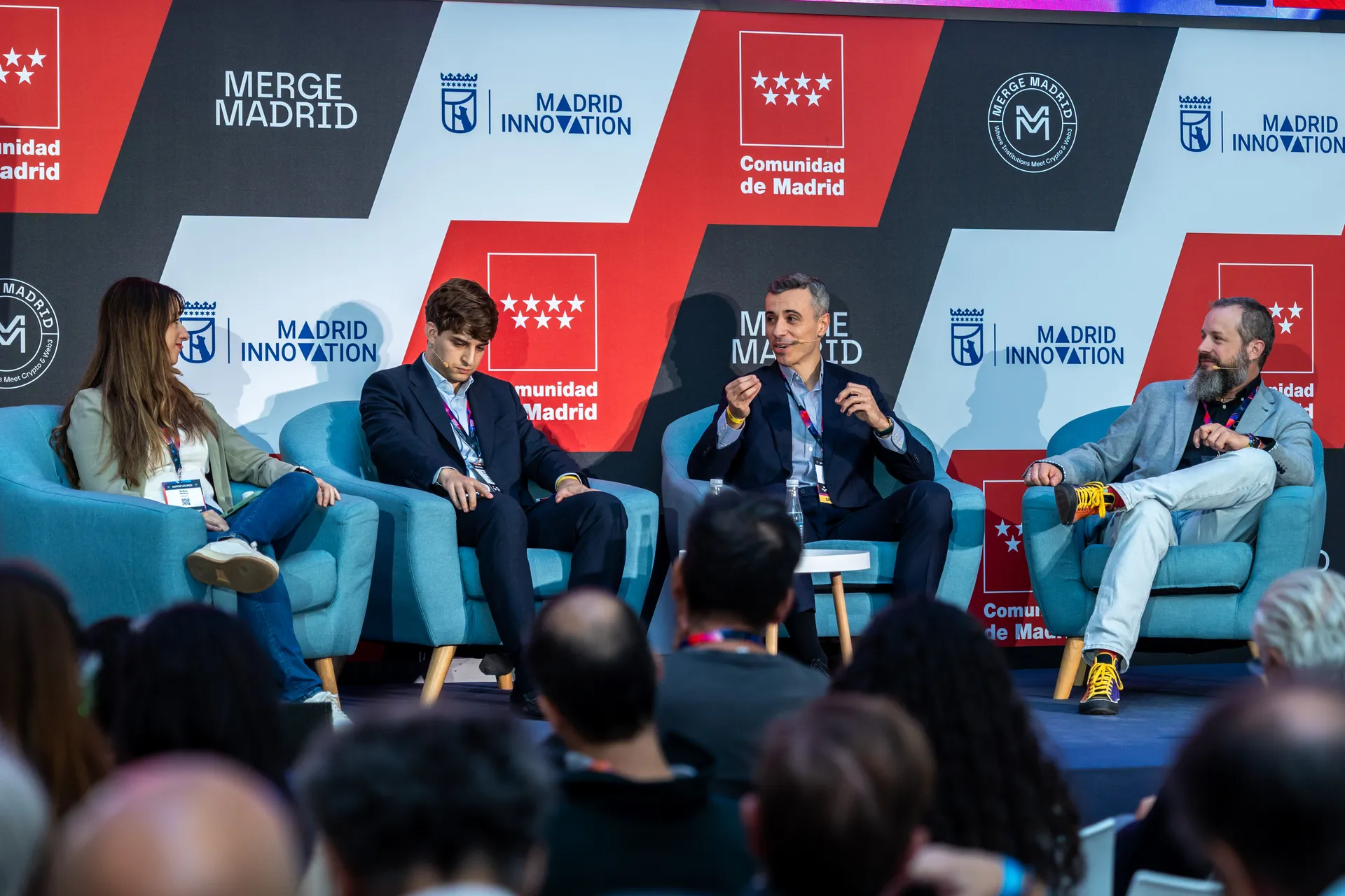 The four panel participants on the MADRID Stage, seen from the audience